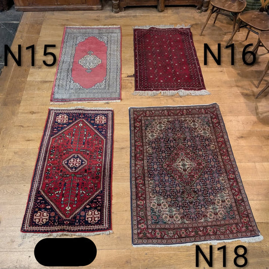 Four Mid-sized Rugs